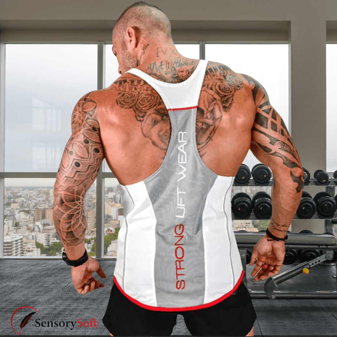 Man wearing a 'Strong Lift Wear' tank top in a gym setting