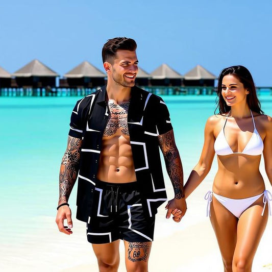 Man and woman holding hands on a beach with clear blue water and sky.