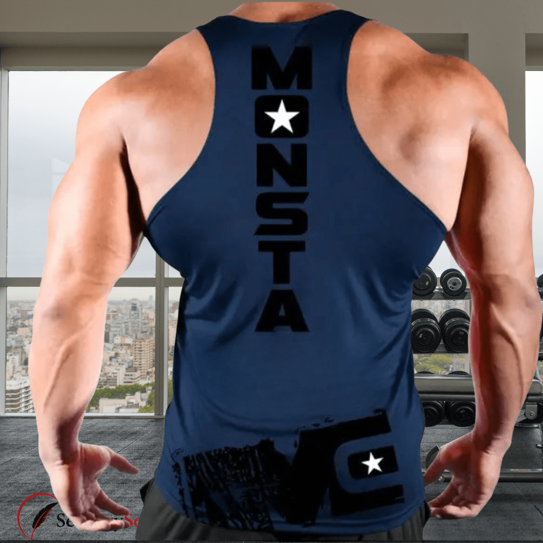 Person wearing a navy blue tank top with 'MONSTA' branding in an indoor setting.