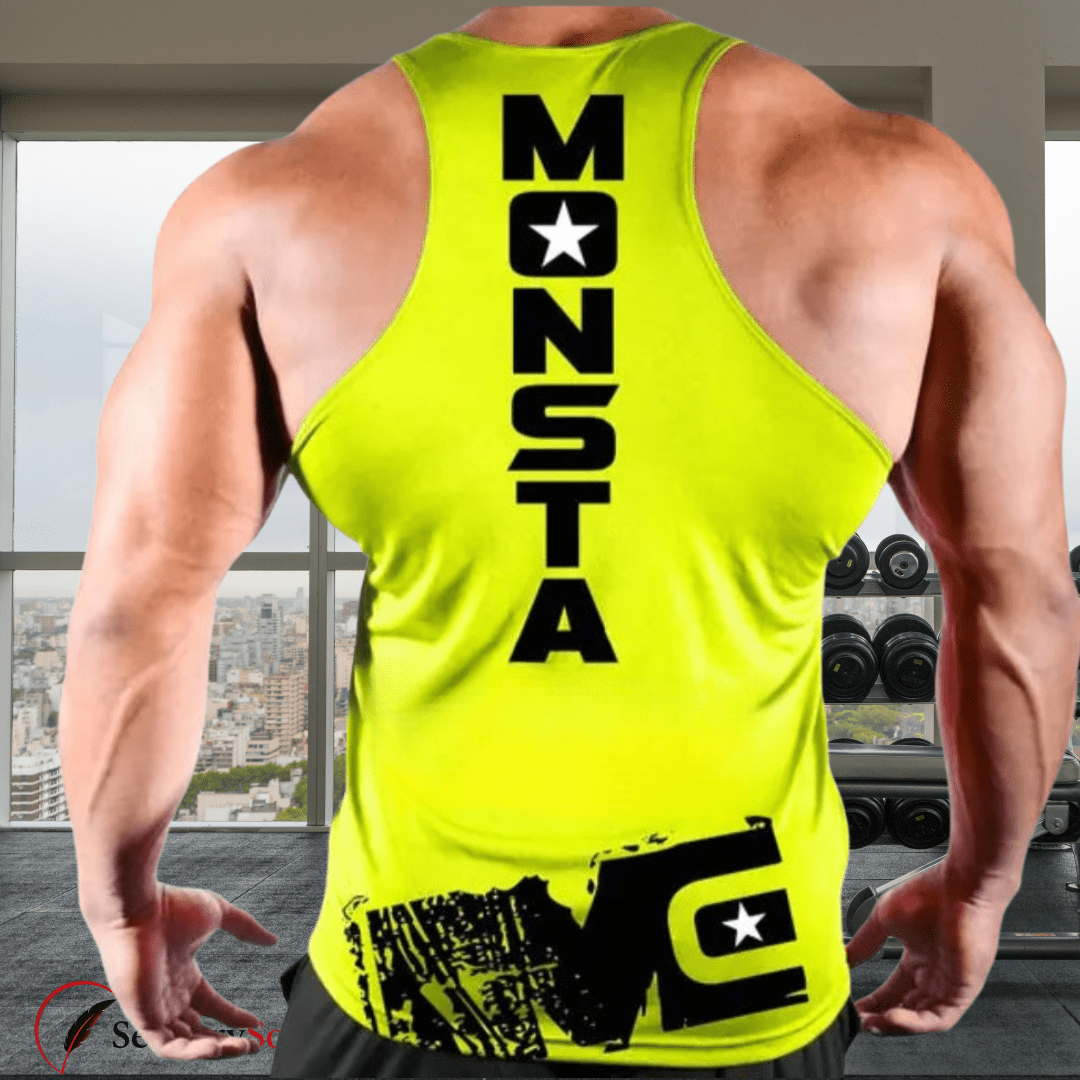Person wearing a bright yellow tank top with 'MONSTA' branding in a gym setting