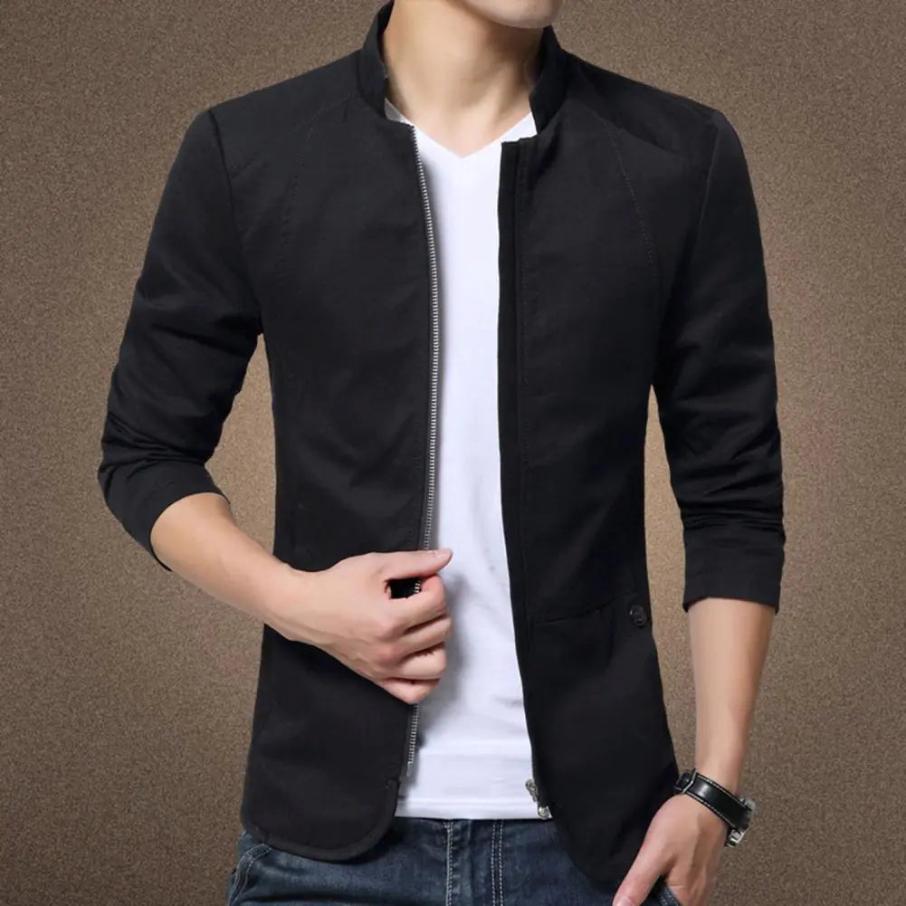 Black jacket over a white shirt with a brown background