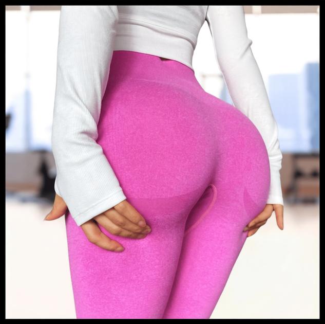Person wearing bright pink leggings with a blurred indoor background
