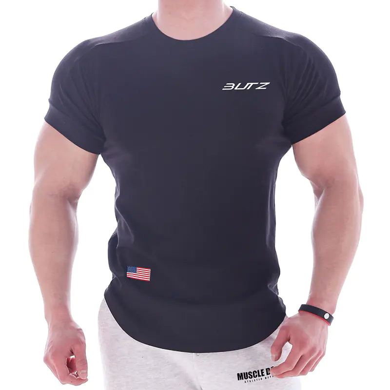 Person wearing a black t-shirt with 'BUTZ' branding on a white background
